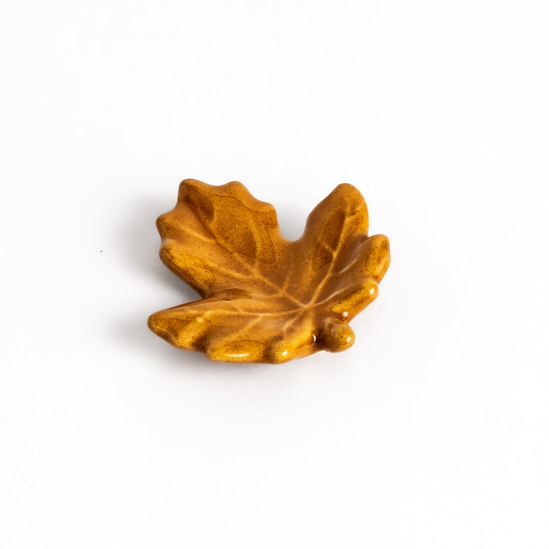 Autumn Maple Leaf Chopstick Rest featuring a detailed maple leaf design in warm brown tones with a glossy finish, perfect for seasonal decor.