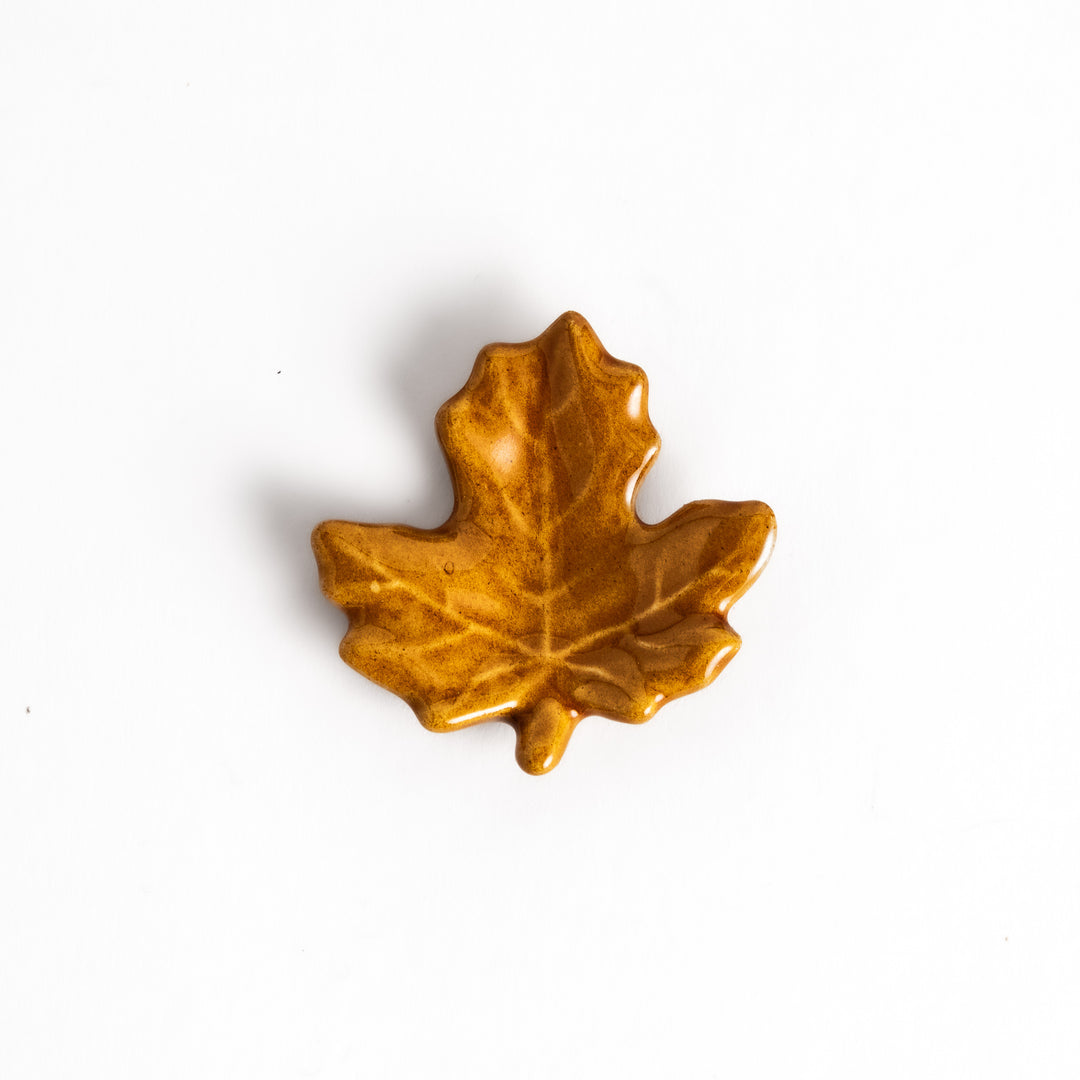 Autumn Maple Leaf Chopstick Rest featuring a detailed maple leaf design in warm brown tones with a glossy finish, perfect for seasonal decor.