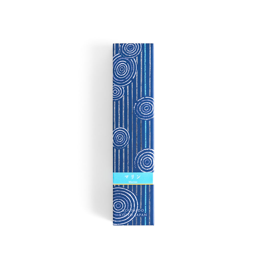 Azure Marine Incense in a light wooden box with deep blue sticks, elegantly packaged in a navy design featuring white circular patterns, evoking a refreshing and invigorating ocean breeze aroma.