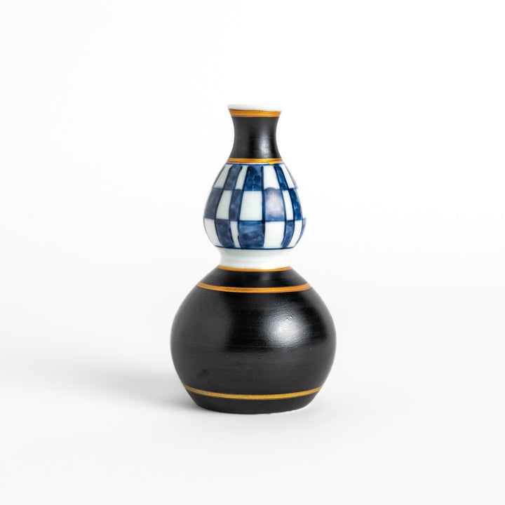 Elegant Japanese Sake Carafe featuring a black and white checkered design, perfect for serving your favorite sake.