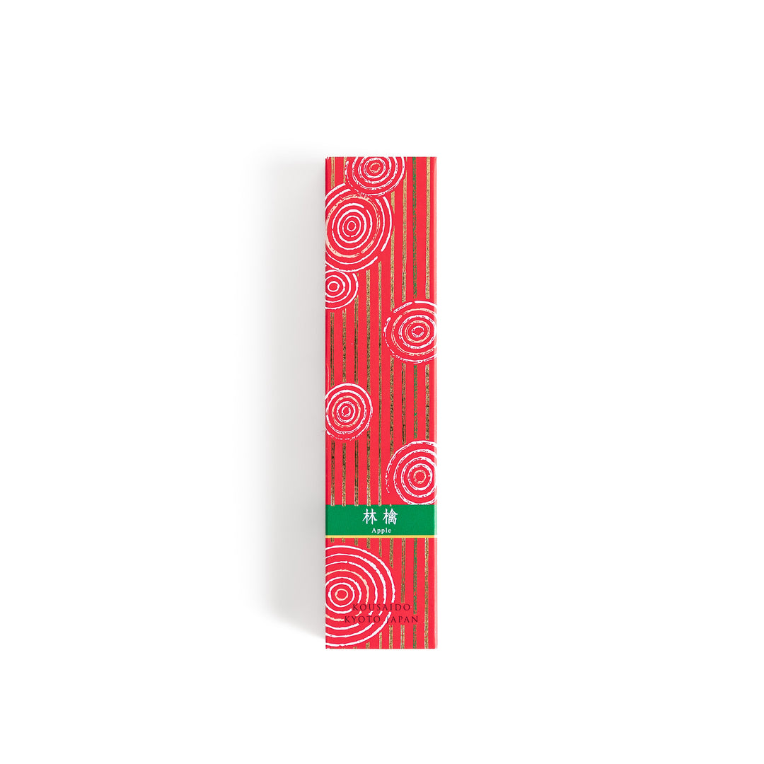 Blissful Apple Incense in a light wooden box with rich red sticks, elegantly packaged in a vibrant red design featuring white circular patterns, evoking a sweet and refreshing apple aroma.