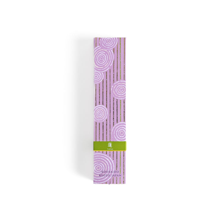 Incense in a light wooden box with rich purple sticks, presented in elegant packaging featuring white circular patterns on a soft lavender background for a serene ambiance.