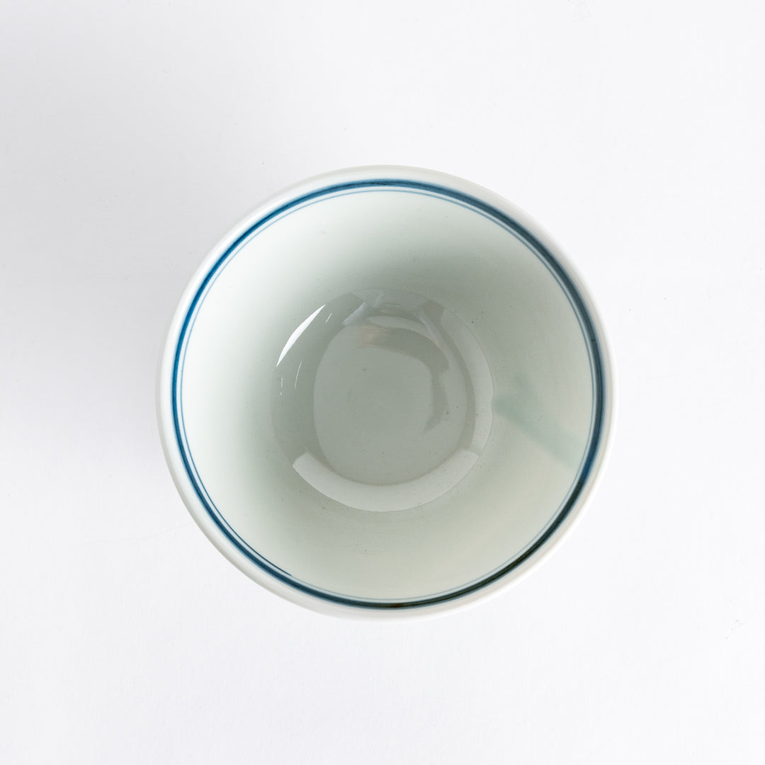 Close-up view of the interior of the donburi bowl, featuring a simple blue line accenting the rim.