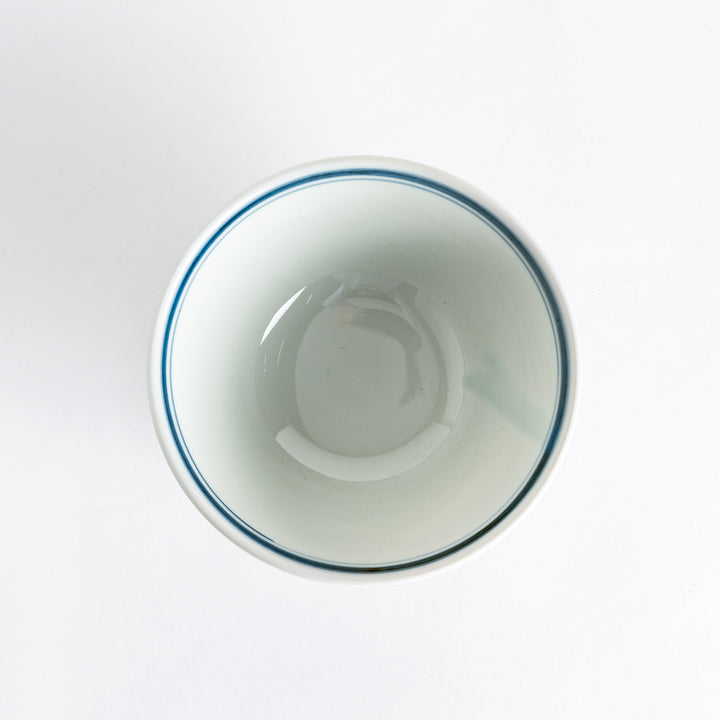 Close-up view of the interior of the donburi bowl, featuring a simple blue line accenting the rim.