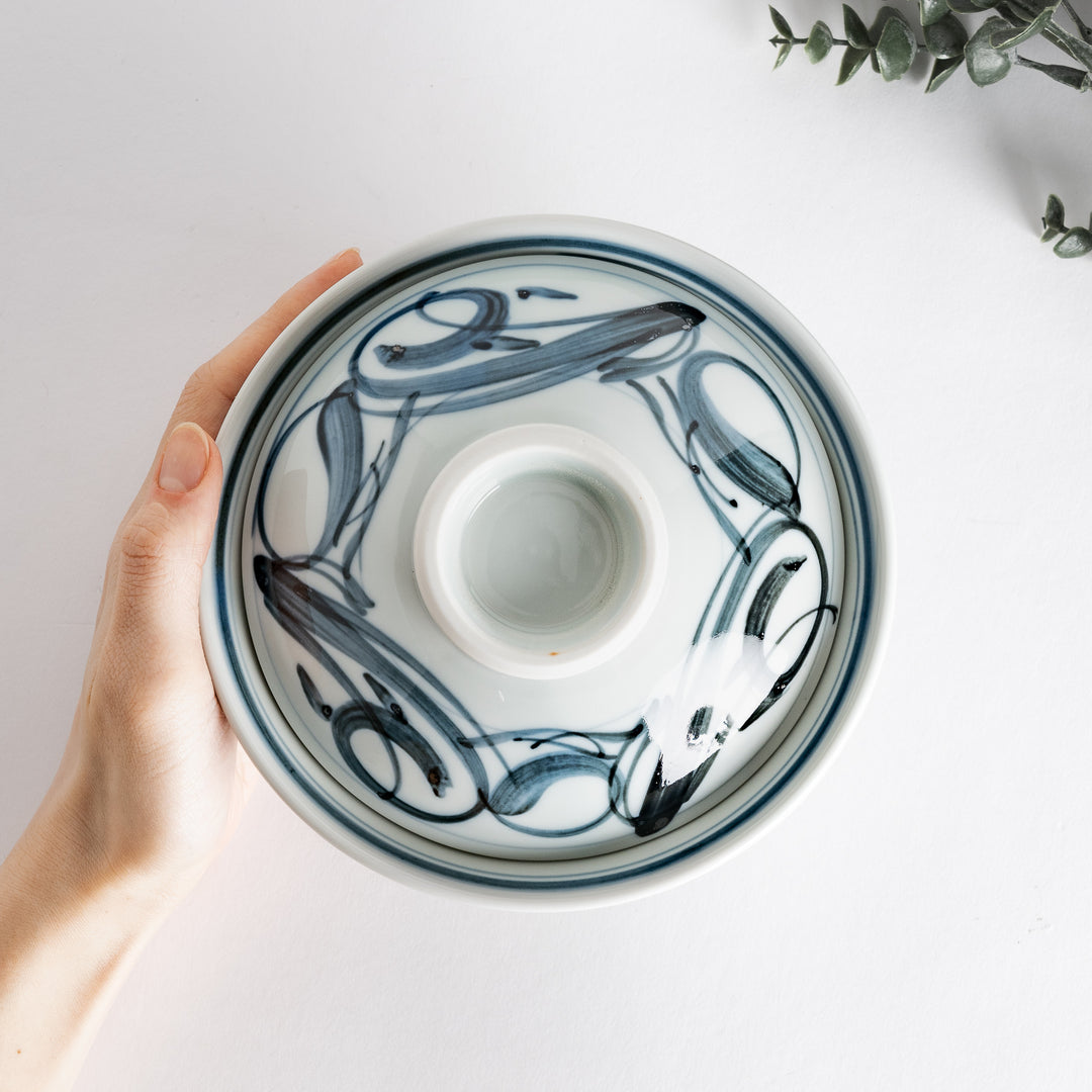 Top view of the donburi bowl highlighting its elegant design and intricate blue arabesque patterns.