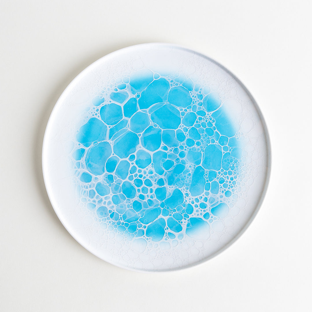 Top-down view of the Bubble Dinner Plate, showcasing the full round design with blue bubble patterns.