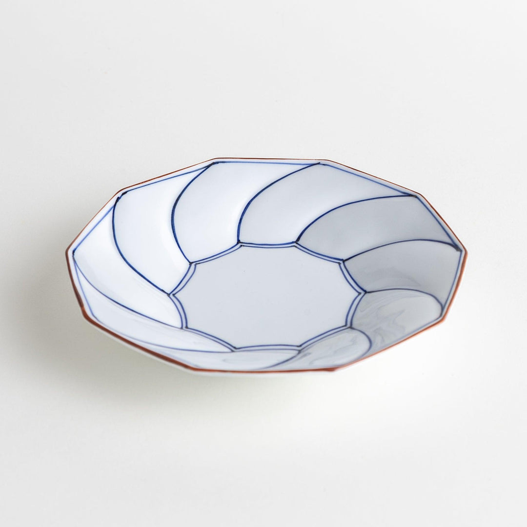 Medium-sized octagonal salad plate with a petal design and bowl shape, outlined in blue and red with a brown rim.