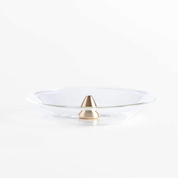 Modern glass Incense Holder with brass accent, a stylish way to enjoy your favorite scents.