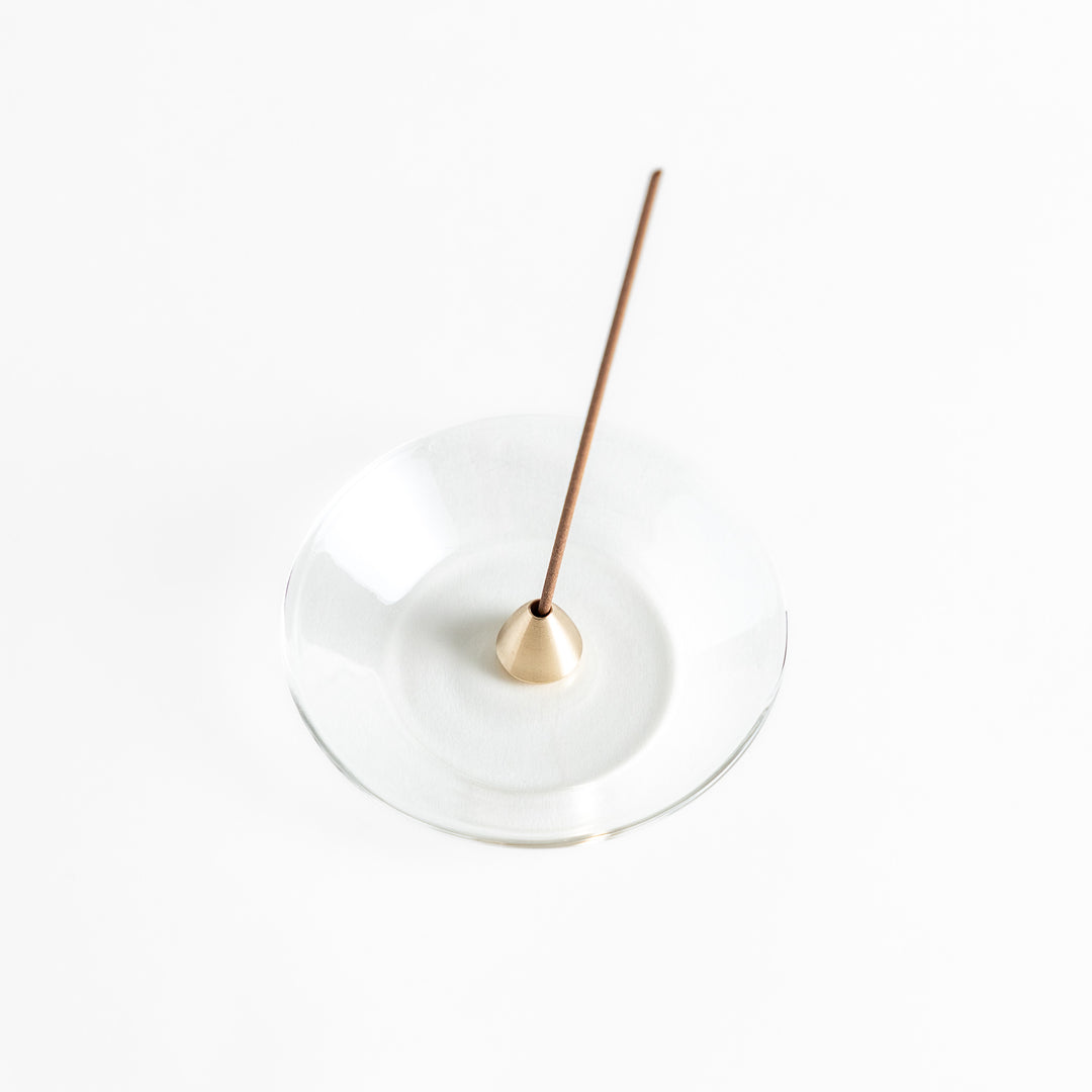 Modern glass Incense Holder with brass accent, a stylish way to enjoy your favorite scents.