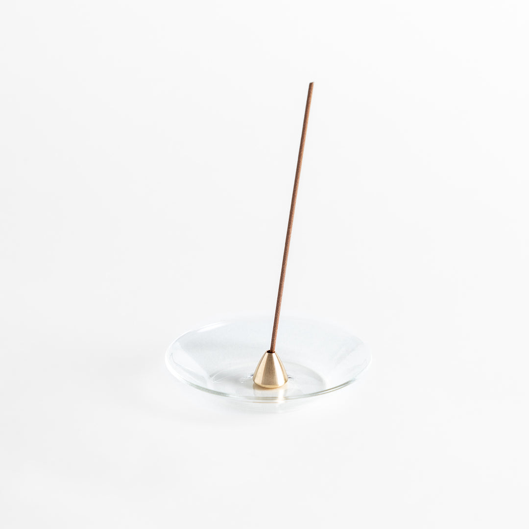 Modern glass Incense Holder with brass accent, a stylish way to enjoy your favorite scents.