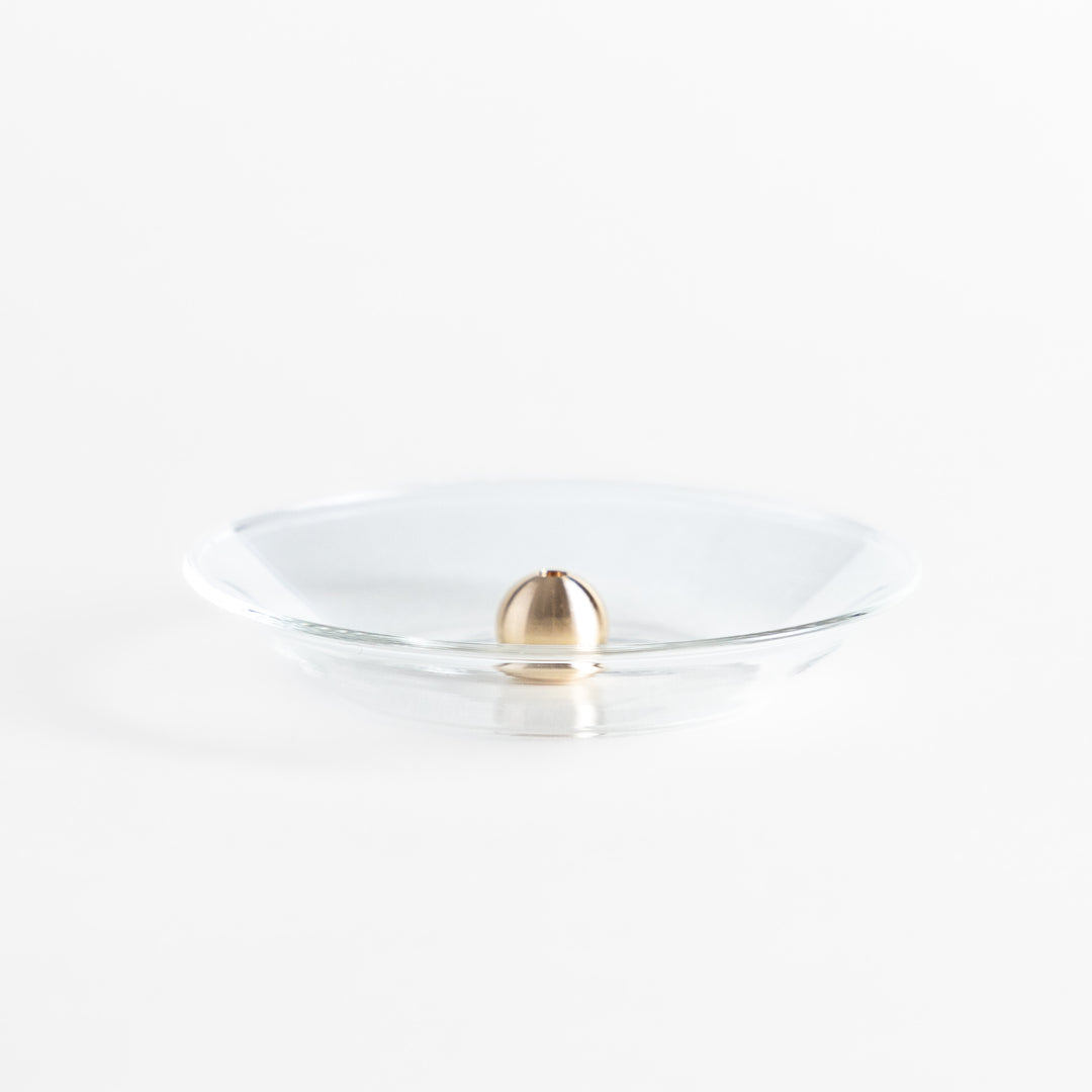 Modern glass Incense Holder with brass accent, a stylish way to enjoy your favorite scents.