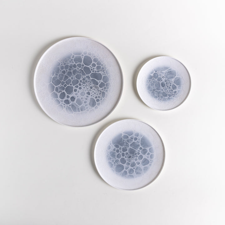 Bubble Three-Piece Plate Set featuring delicate bubble-like patterns, arranged from largest to smallest for a harmonious look.