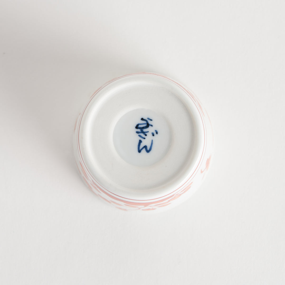 A white condiment bowl decorated with blue bush clover patterns around the side, ideal for small servings or sauces.