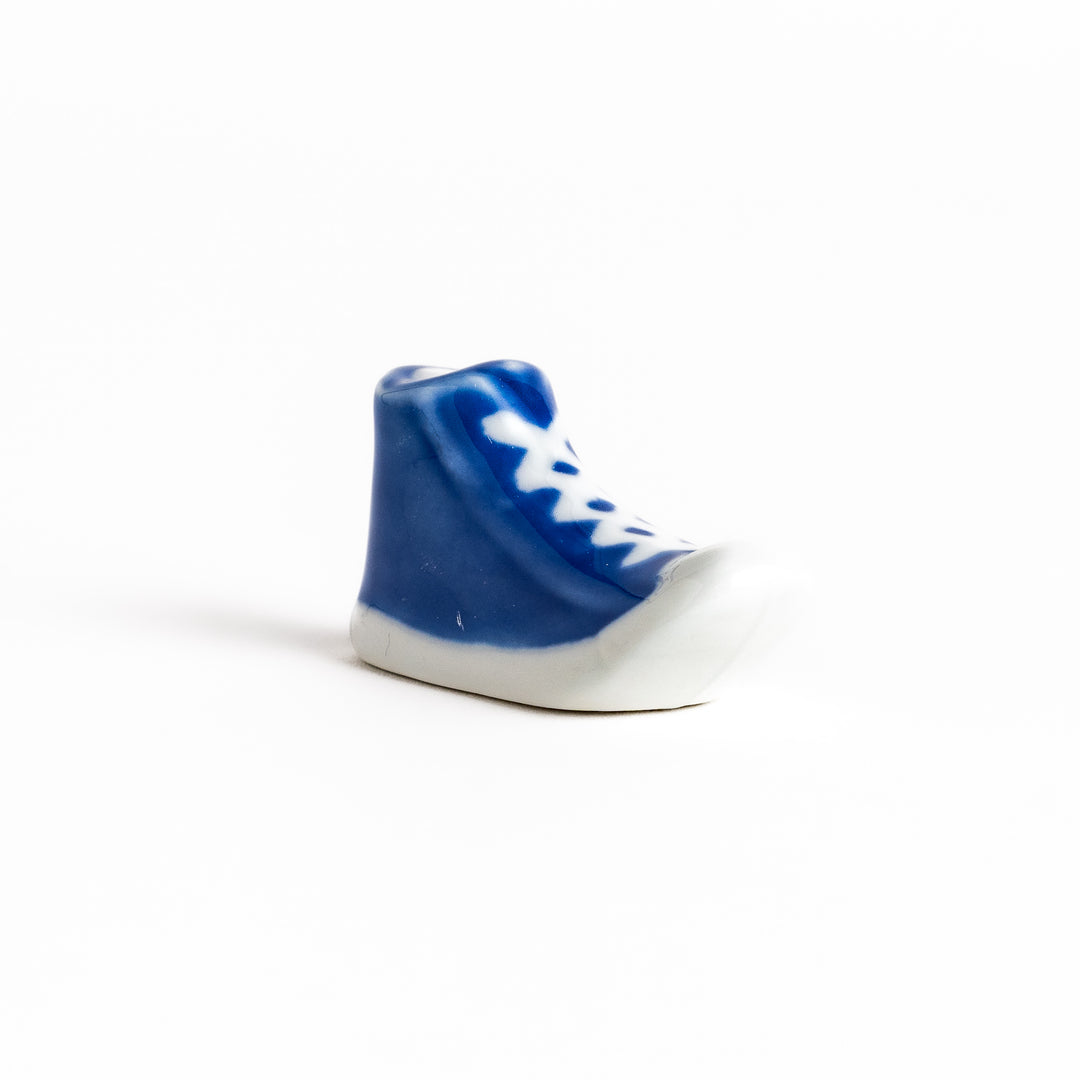 Blue Canvas Sneaker Chopstick Rest with white laces and a detailed high-top design, adding a playful touch to your table setting.