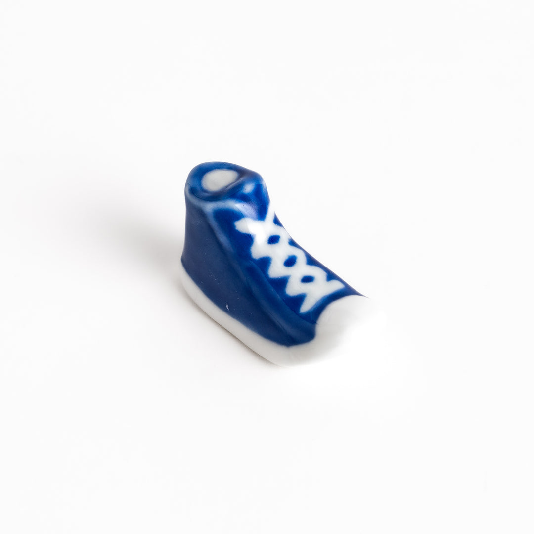 Blue Canvas Sneaker Chopstick Rest with white laces and a detailed high-top design, adding a playful touch to your table setting.