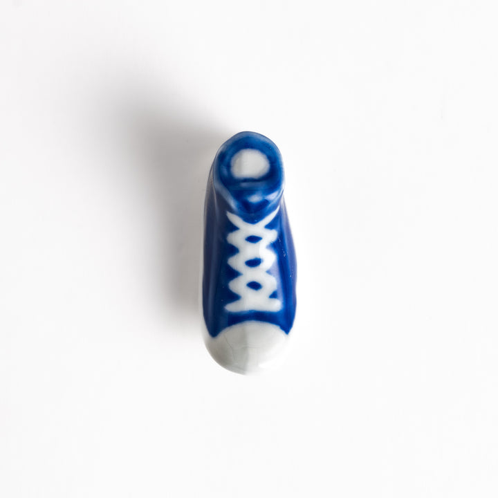 Blue Canvas Sneaker Chopstick Rest with white laces and a detailed high-top design, adding a playful touch to your table setting.