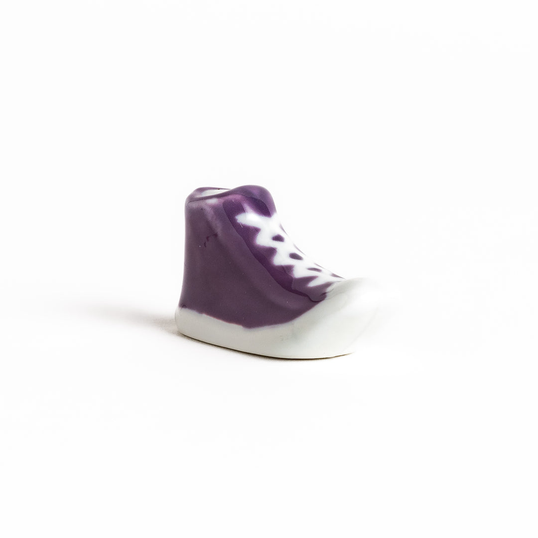 Purple Canvas Sneaker Chopstick Rest with white laces and a detailed high-top design, adding a playful touch to your table setting.