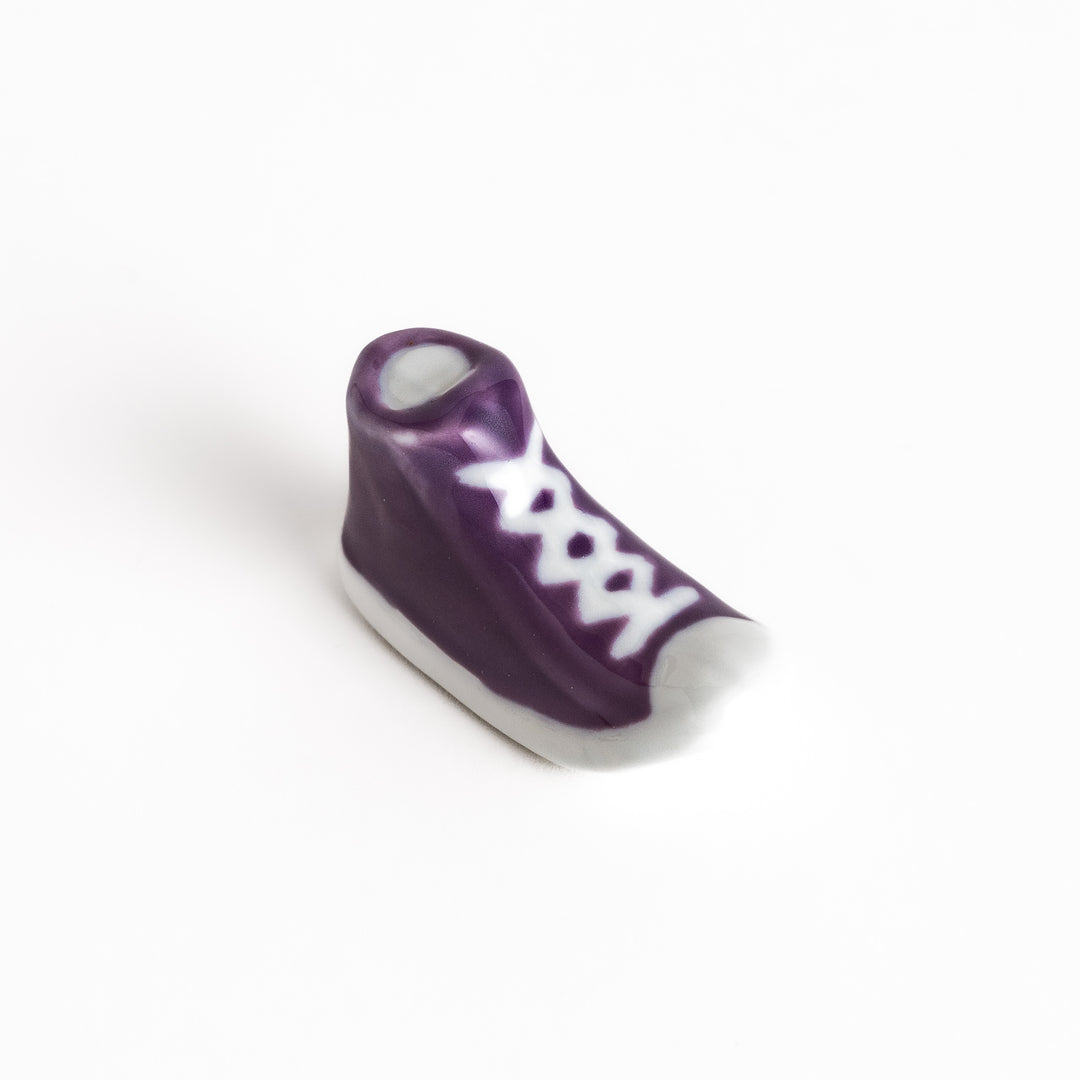 Purple Canvas Sneaker Chopstick Rest with white laces and a detailed high-top design, adding a playful touch to your table setting.