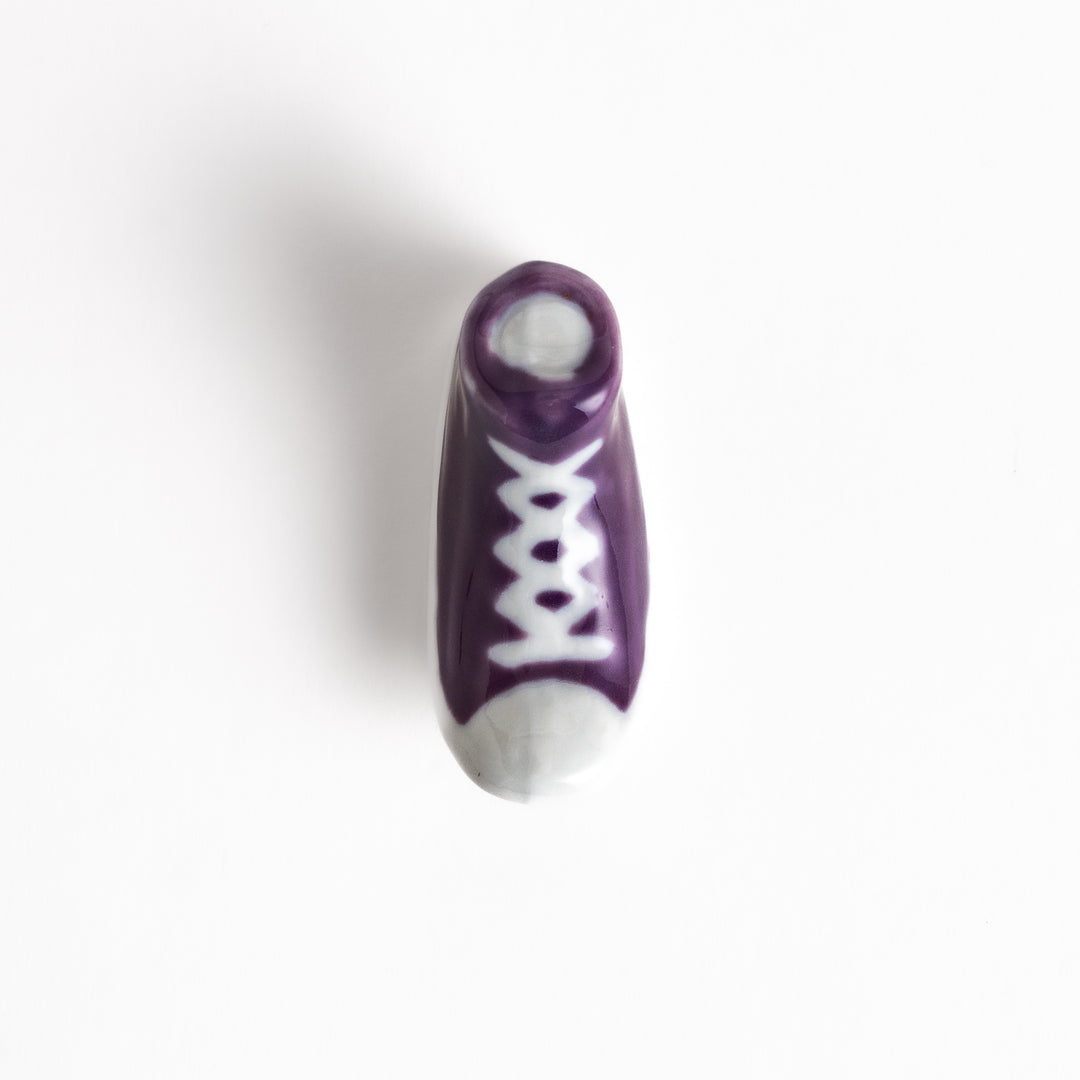 Purple Canvas Sneaker Chopstick Rest with white laces and a detailed high-top design, adding a playful touch to your table setting.