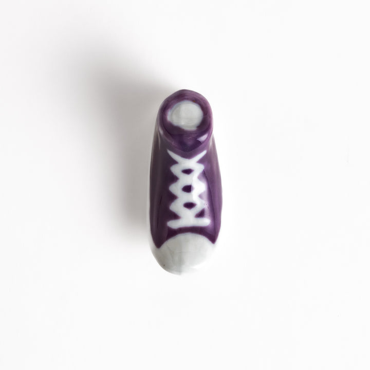 Purple Canvas Sneaker Chopstick Rest with white laces and a detailed high-top design, adding a playful touch to your table setting.