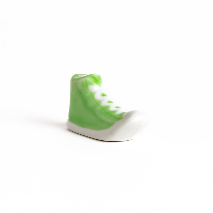 Light Green Canvas Sneaker Chopstick Rest with white laces and a detailed high-top design, adding a playful touch to your table setting.