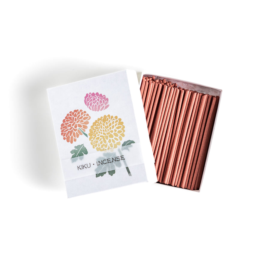 Incense featuring warm reddish-brown sticks in a box decorated with vibrant chrysanthemum flowers, offering a refined floral aroma for a calming atmosphere.