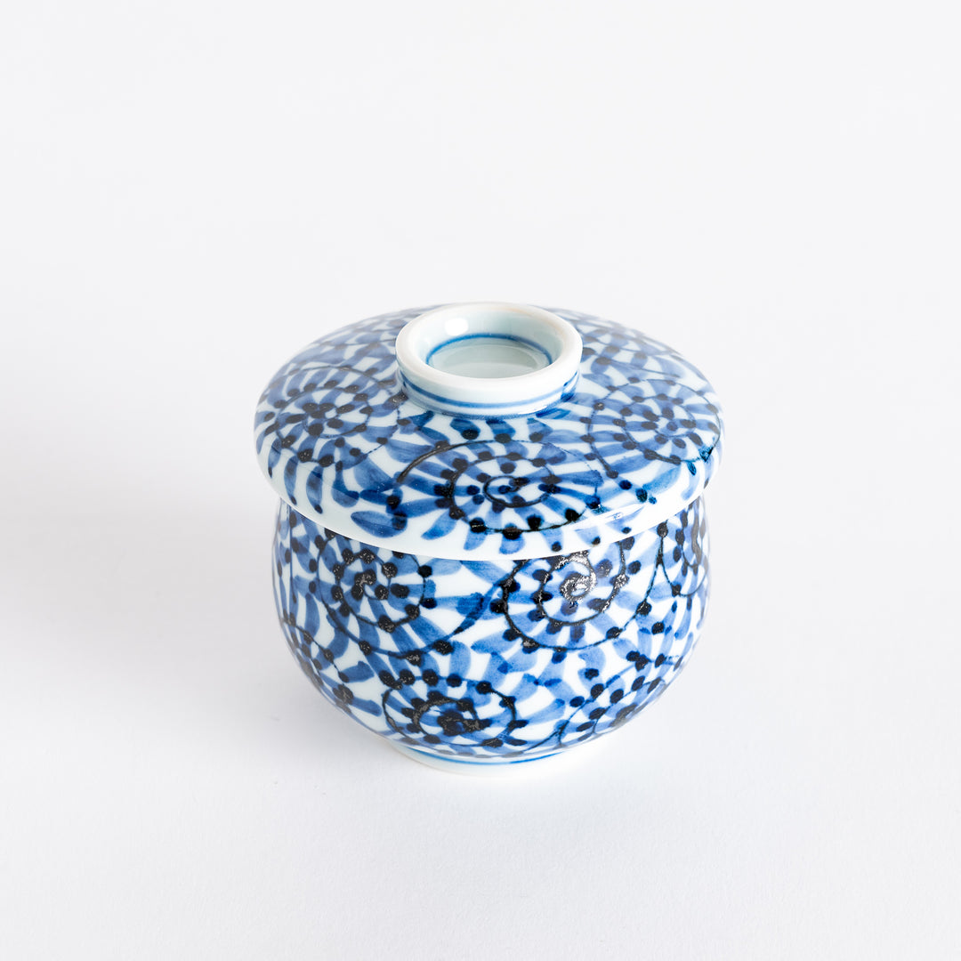 Chawanmushi Bowl featuring a delicate blue and white spiral pattern, with a matching lid on top.