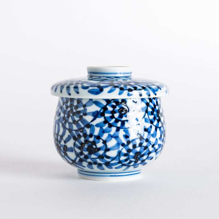 Side view of the Chawanmushi Bowl displaying the spiral pattern and the round shape of the bowl.