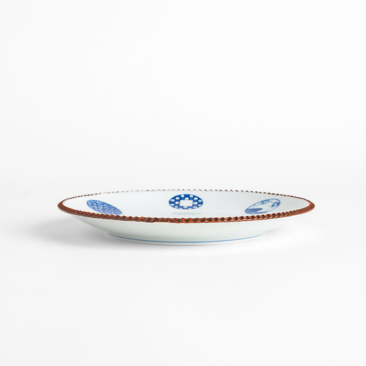 Elegant ceramic salad plate featuring a classic blue and white pattern, adding a touch of sophistication to your table.