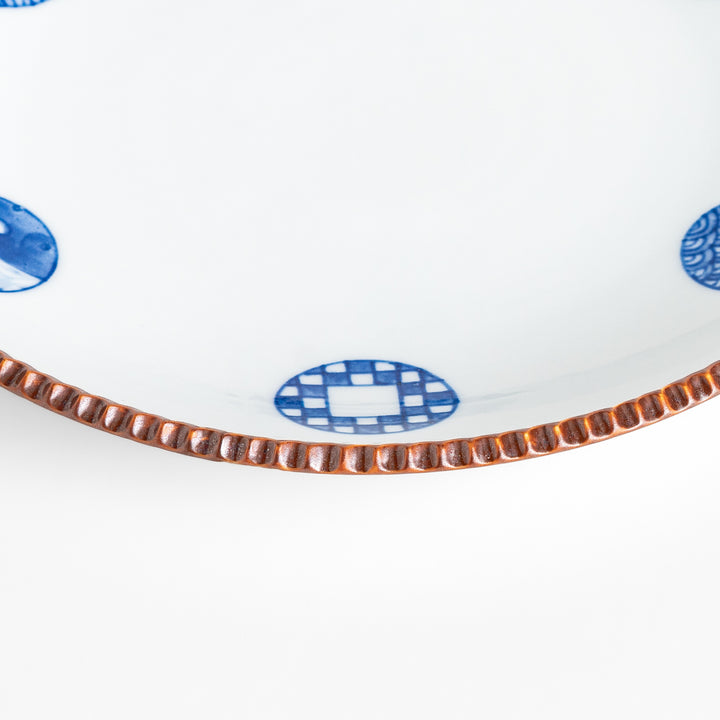 Elegant ceramic salad plate featuring a classic blue and white pattern, adding a touch of sophistication to your table.