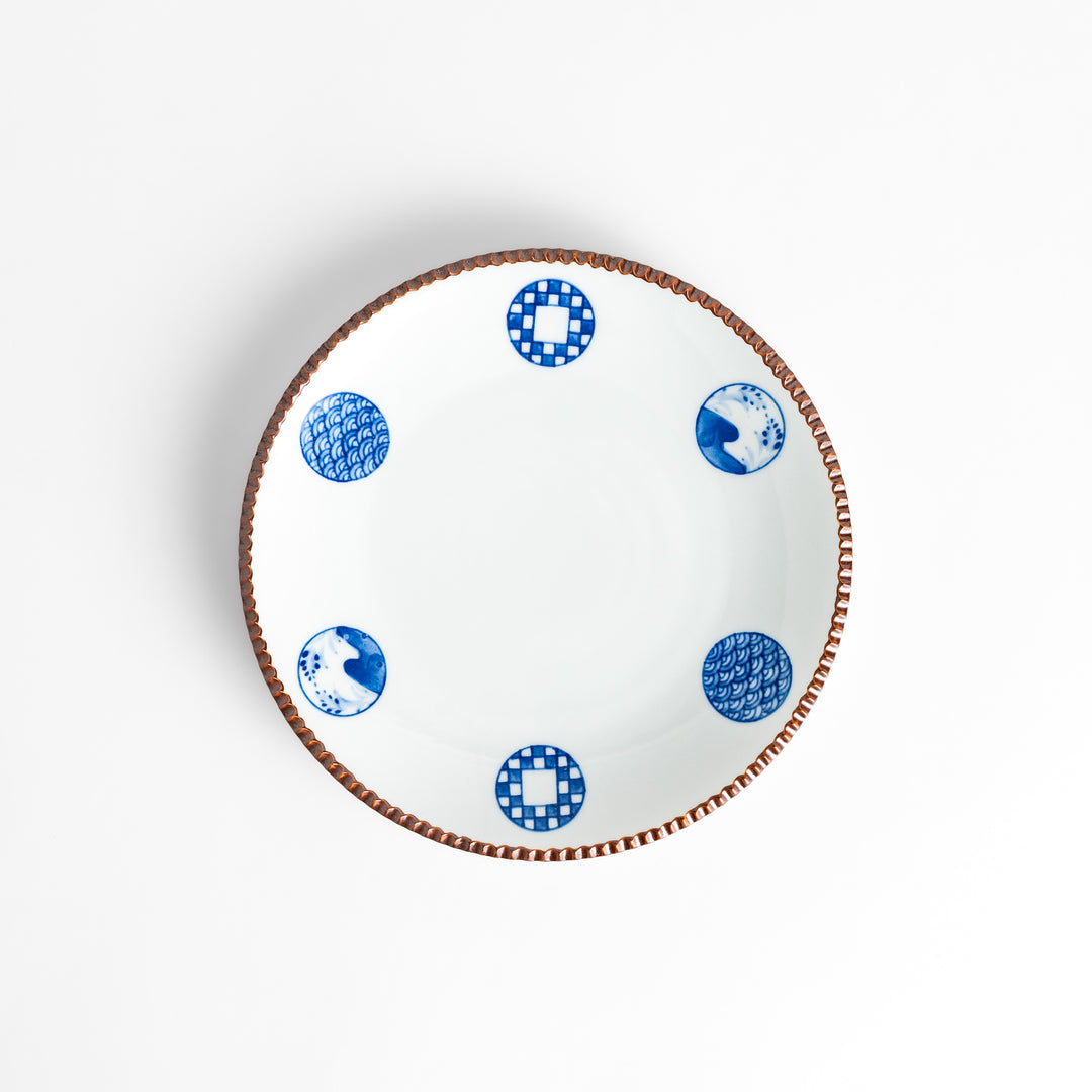 Elegant ceramic salad plate featuring a classic blue and white pattern, adding a touch of sophistication to your table.