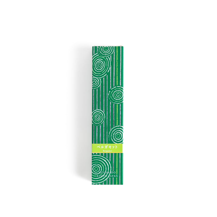 Citrusy Bergamot Incense in a light wooden box with earthy green sticks, elegantly packaged in a vibrant green design featuring white circular patterns, evoking a fresh and uplifting citrus aroma.