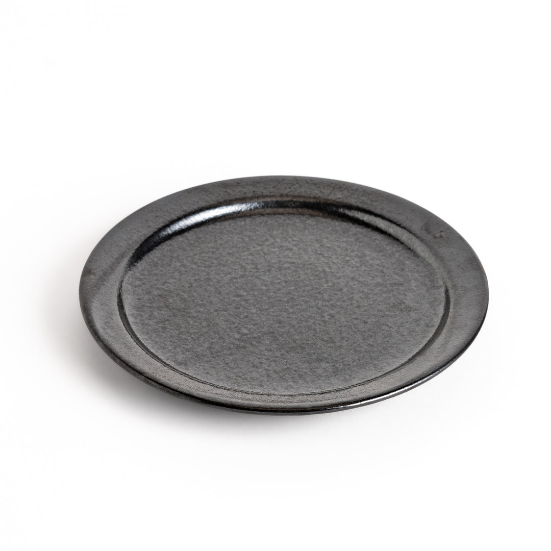 Elegant black salad plate with a smooth matte glaze, perfect for presenting salads or side dishes stylishly.