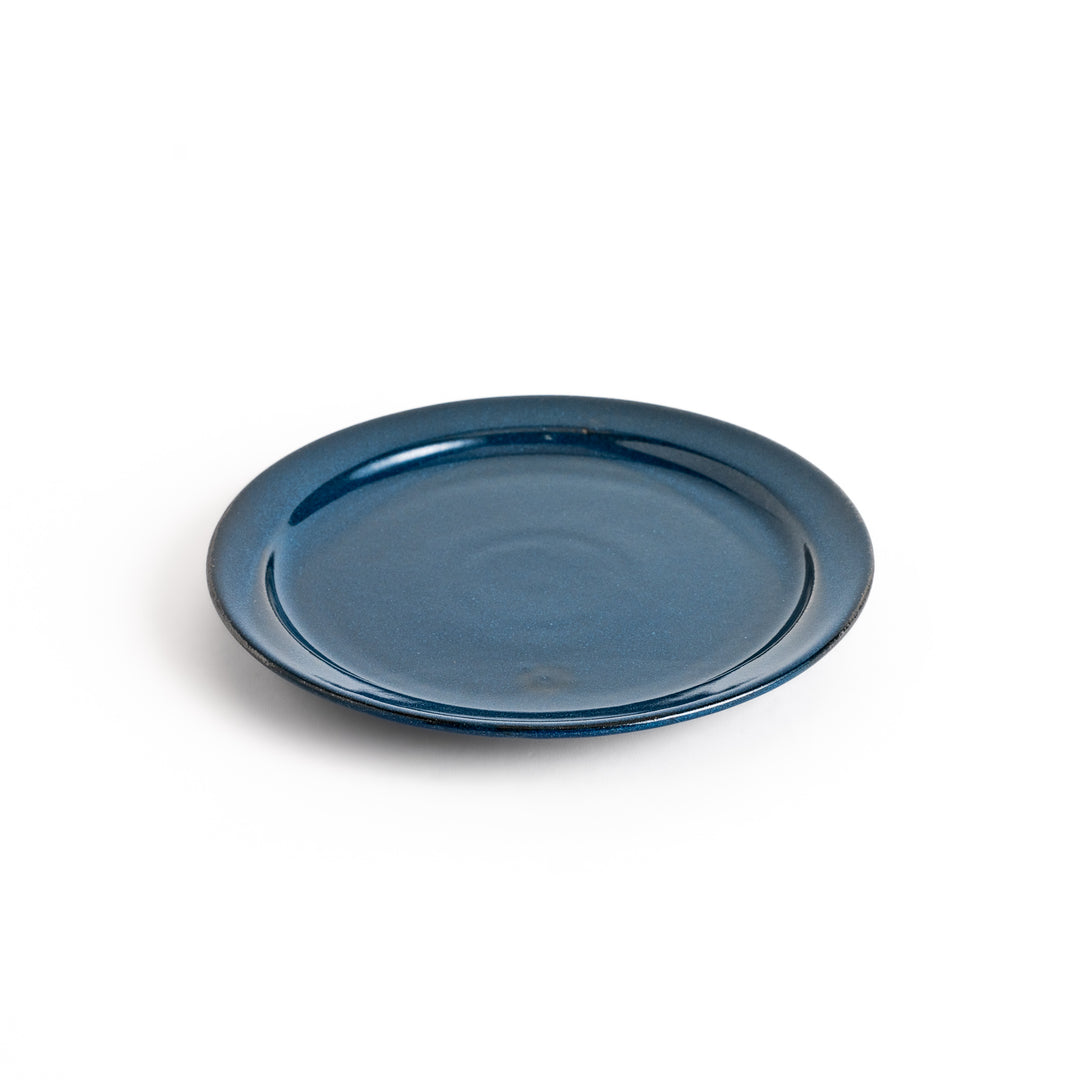 Elegant blue salad plate with a smooth matte glaze, perfect for presenting salads or side dishes stylishly.