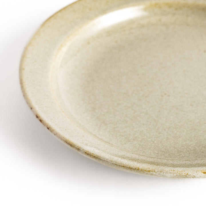 White ceramic sauce dish with a glossy finish and a minimalist design, ideal for serving dips or condiments elegantly.