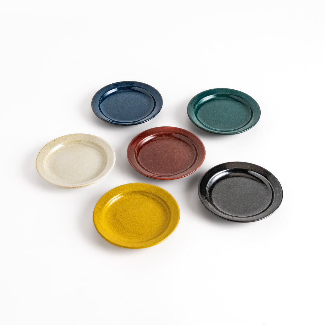 Six ceramic sauce dishes in vibrant colors: black, white, red, blue, green, and yellow, featuring a glossy finish.