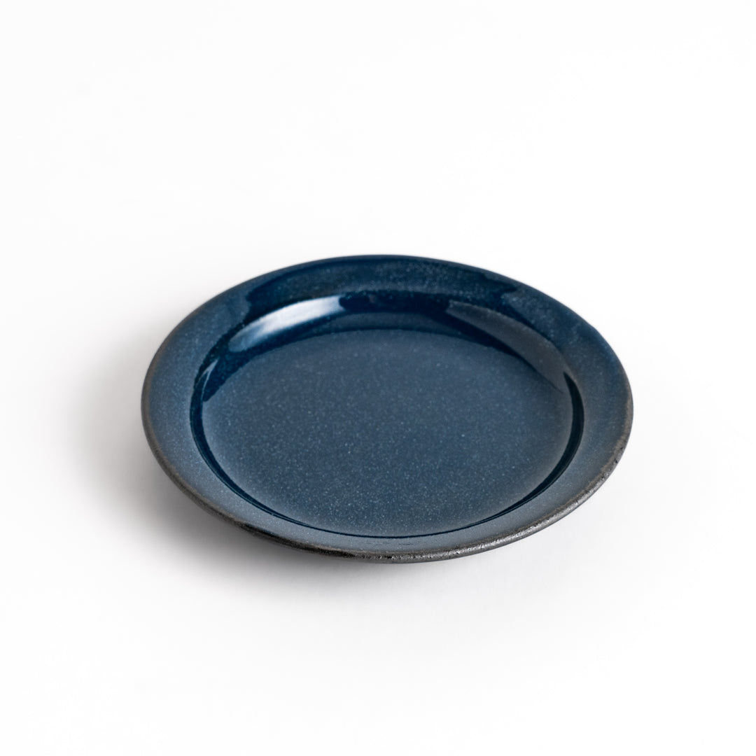 Blue ceramic sauce dish with a glossy finish and a minimalist design, ideal for serving dips or condiments elegantly.