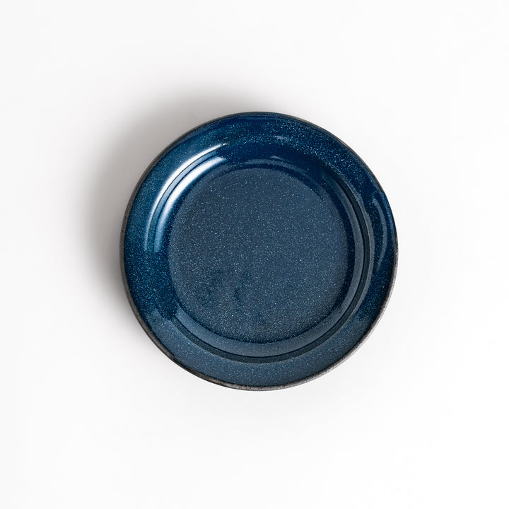 Blue ceramic sauce dish with a glossy finish and a minimalist design, ideal for serving dips or condiments elegantly.