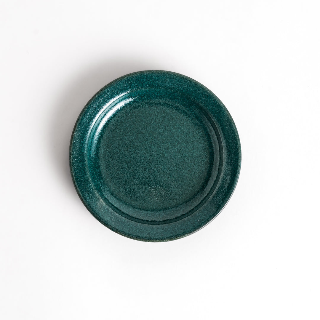 Green ceramic sauce dish with a glossy finish and a minimalist design, ideal for serving dips or condiments elegantly.