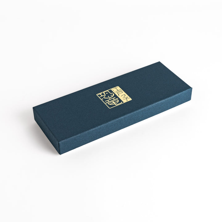 Elegant blue gift box with a gold inscription, perfect for presenting a special gift.