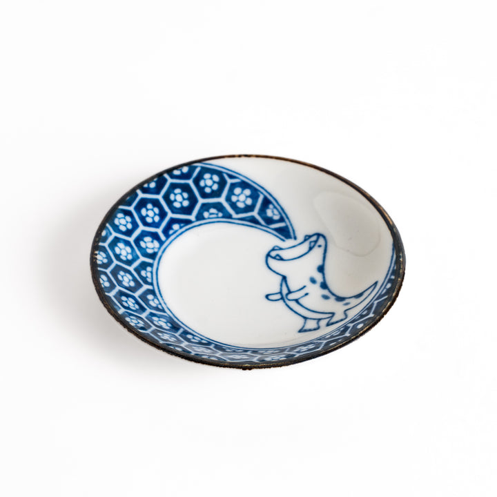 Small sauce plate with a cute dinosaur design and a traditional Japanese geometric pattern, perfect for adding a playful touch to your dining table.