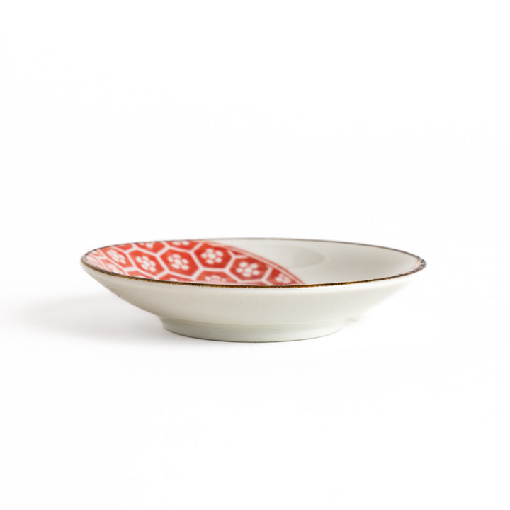 Small sauce plate with a cute dinosaur design and a traditional Japanese geometric pattern, perfect for adding a playful touch to your dining table.