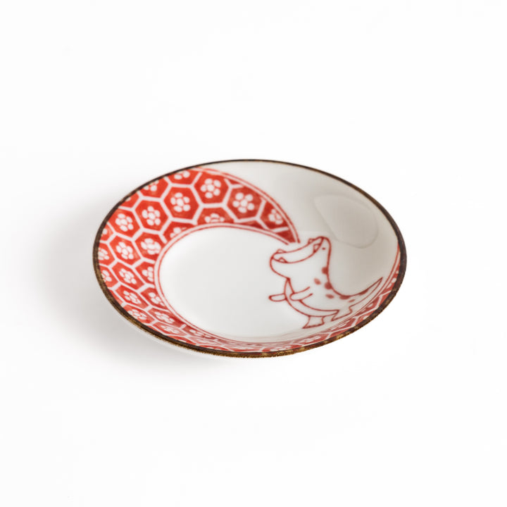 Small sauce plate with a cute dinosaur design and a traditional Japanese geometric pattern, perfect for adding a playful touch to your dining table.