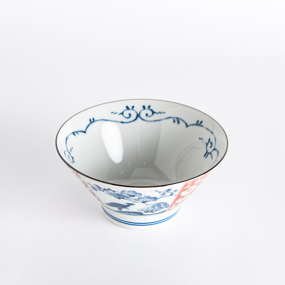 A hand holding the Edo Dinosaur Donburi bowl, displaying its colorful interior design against a neutral background.