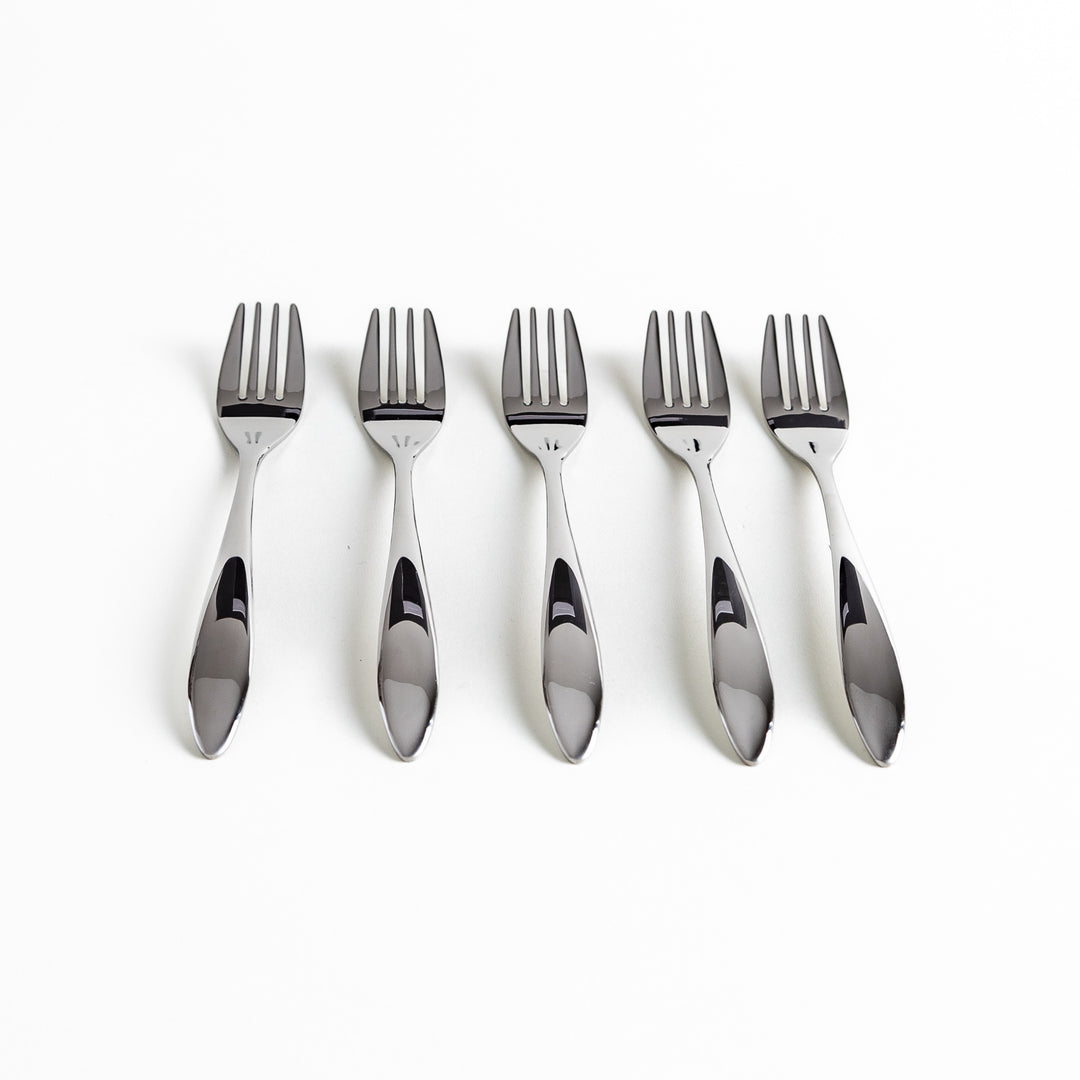 Five stainless steel forks aligned horizontally, showcasing their sleek handles.