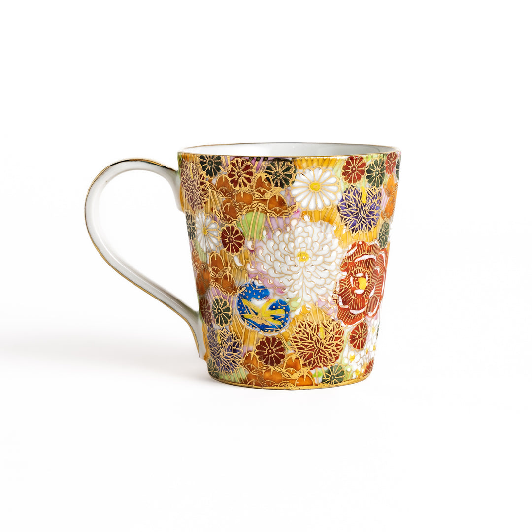 Elegant ceramic mug with a vibrant floral pattern in gold and pastel colors, perfect for adding a touch of sophistication to your daily routine.