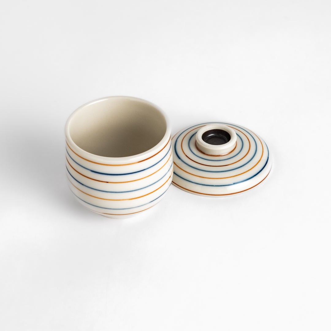 Classic Chawanmushi Bowl with a unique striped pattern and lid, ideal for enjoying savory steamed egg custard.