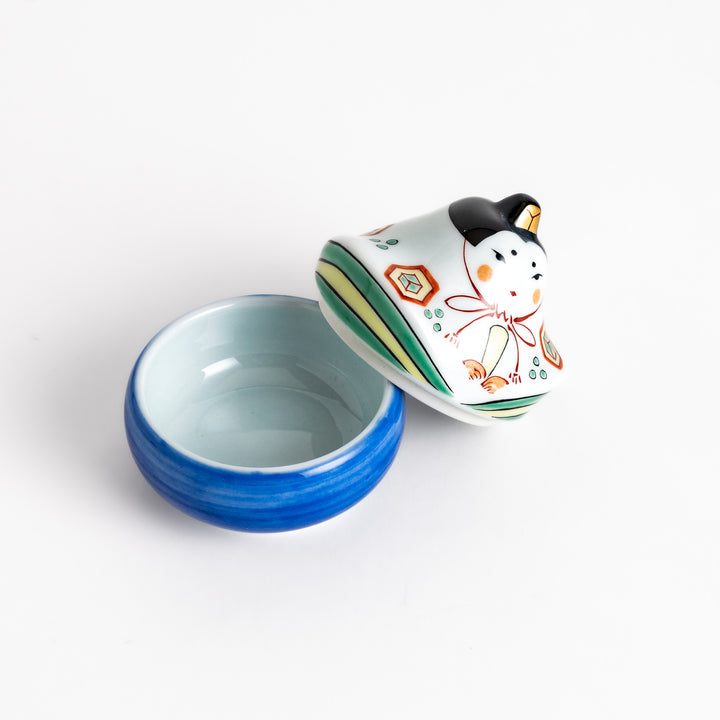 Ceramic condiment bowl with a charming traditional Japanese doll design, perfect for serving small portions of spices, sauces, or snacks.