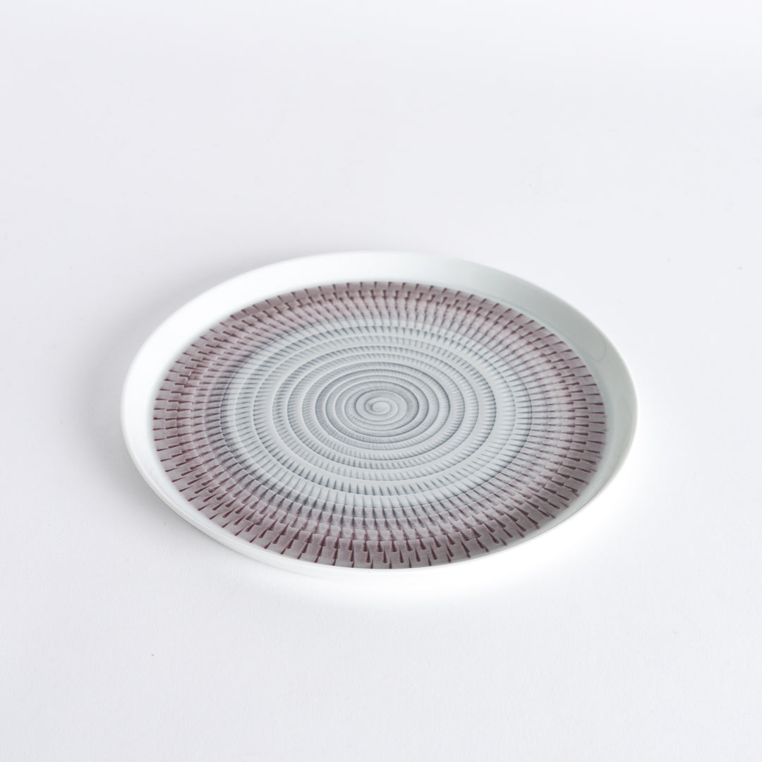 Slightly angled view of the plate, highlighting the light purple spiral pattern and subtle curvature.