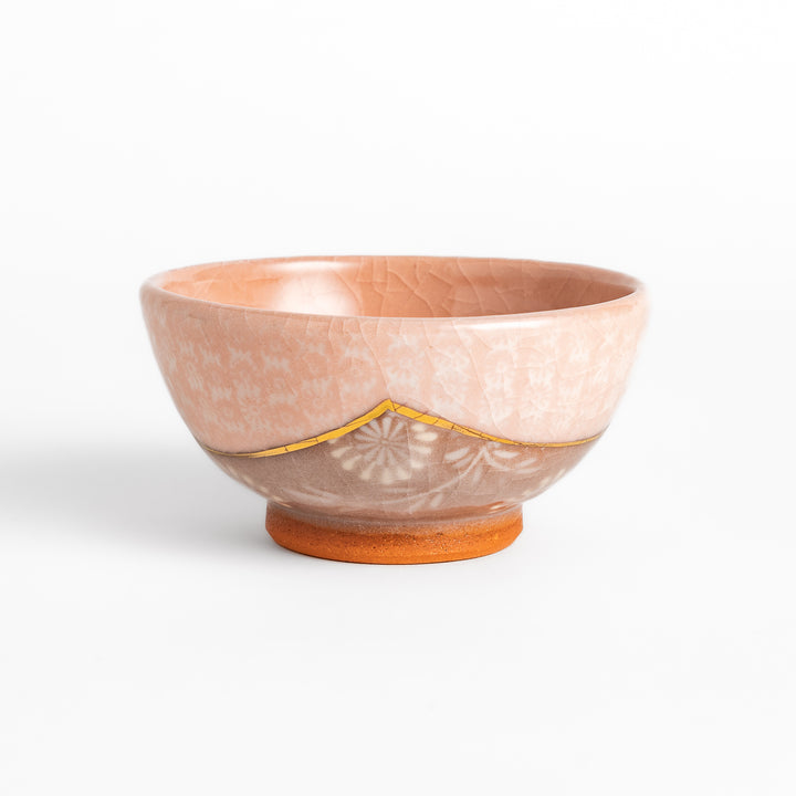 Authentic rice bowl, showcasing traditional Japanese artistry with a meticulously hand-painted, colorful floral motif.